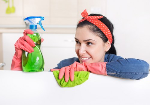 Specialist treating a carpet stain in Islington