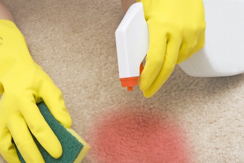 Commercial cleaning team working in an Islington office reception area