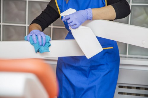 Local technician treating mattress stains in a North London flat